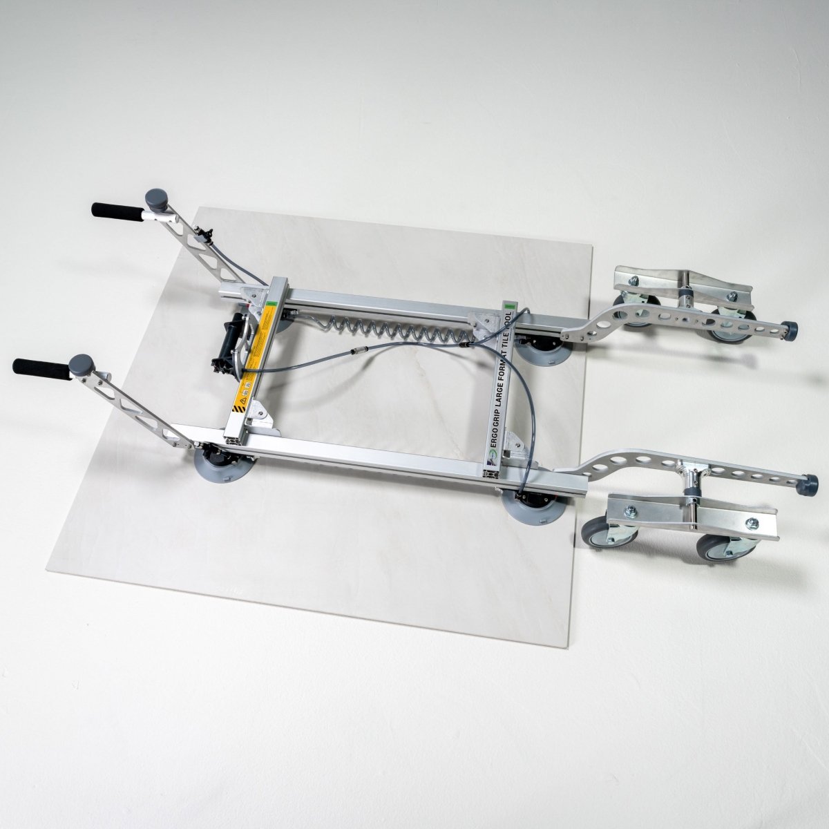 Ergonomic Grip Tool for Large Format Floor Tiles