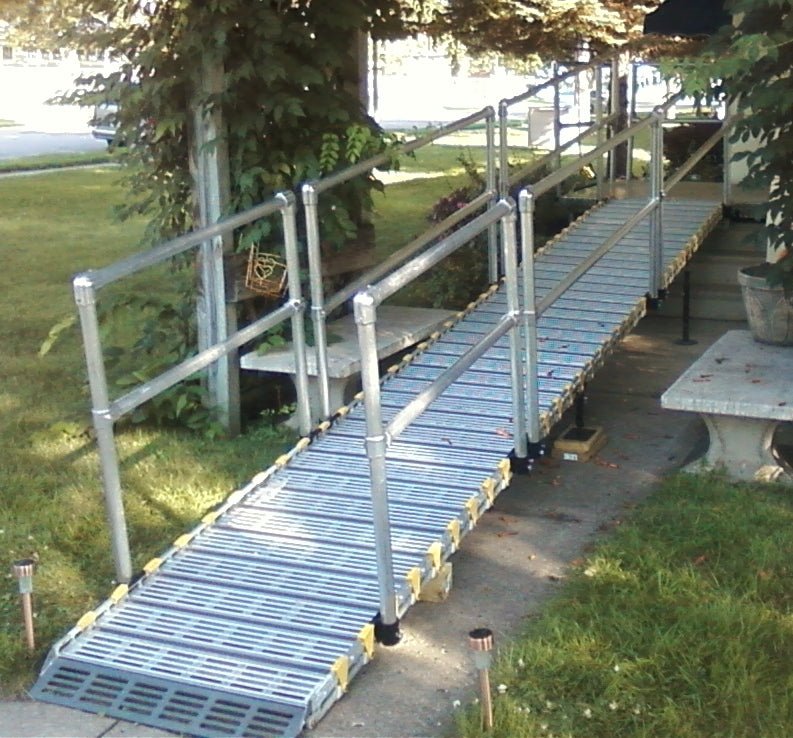 26-Inch Wide Roll-A-Ramp® Modular Ramp System Equipped with Straight End Handrails for Enhanced Accessibility