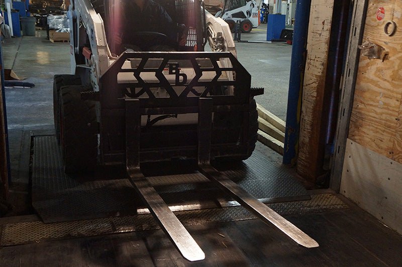 Heavy - Duty Standard - Duty Pallet Forks with a Capacity of 4,000 Pounds for Skid Steers